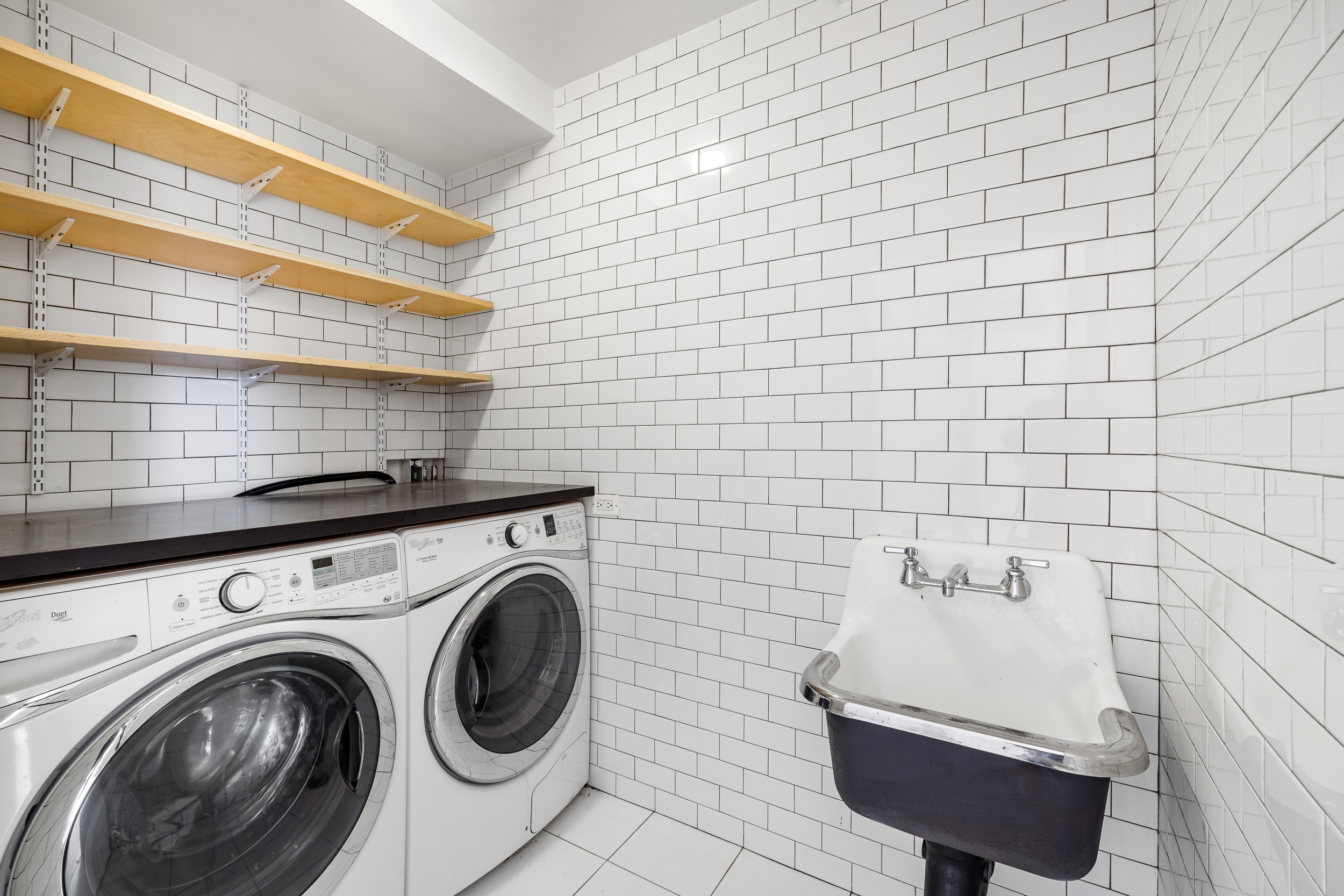 361 Manhattan Avenue, Unit 3AB Brooklyn, NY 11211 - Photo 15 of 21 a utility room with dryer and washer