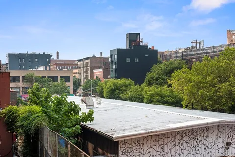 a view of a terrace with a yard