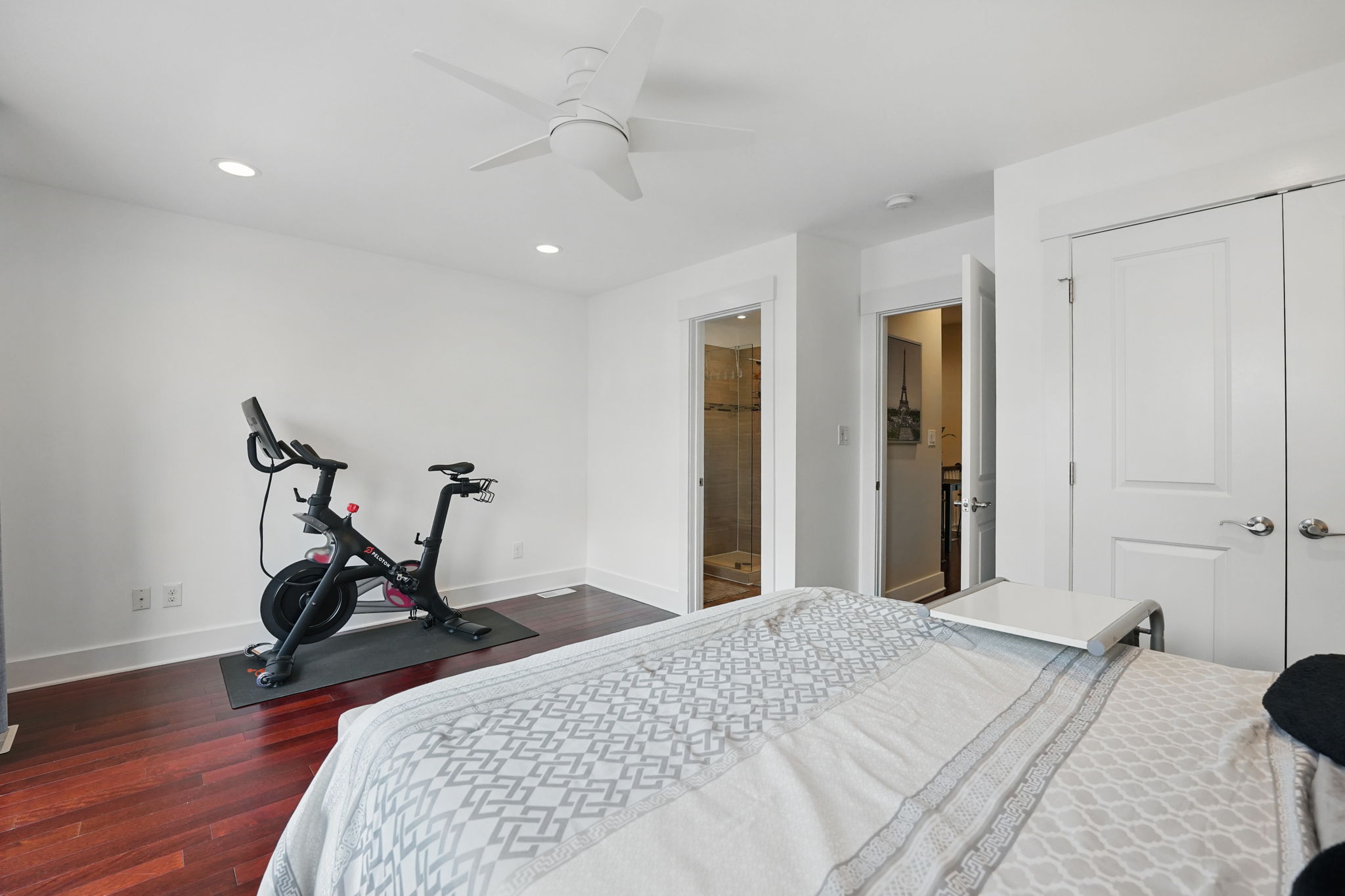 28 Q Street Northeast, Unit 2 Washington, DC 20002 - Photo 32 of 41 a bedroom with a bed and wooden floor