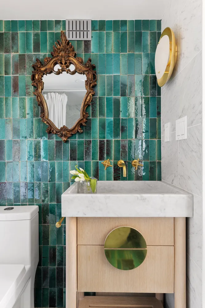 a bathroom with a sink a mirror and shower