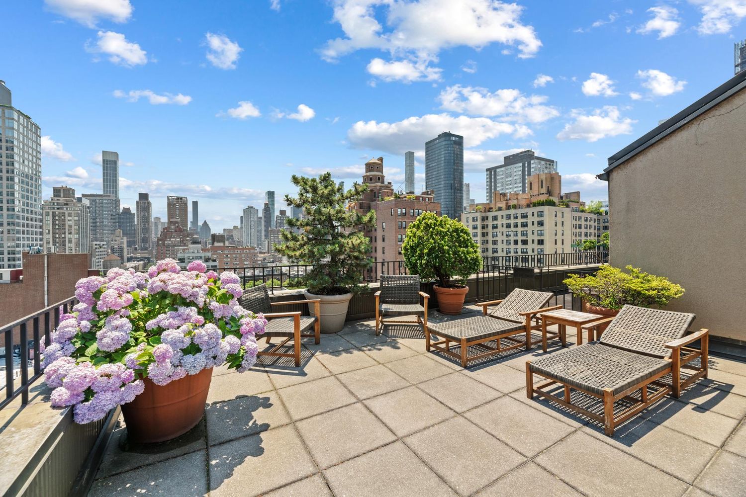 333 East 69th Street, Unit 7F Manhattan, NY 10021 - Photo 11 of 12 a outdoor living space with furniture and a potted plant