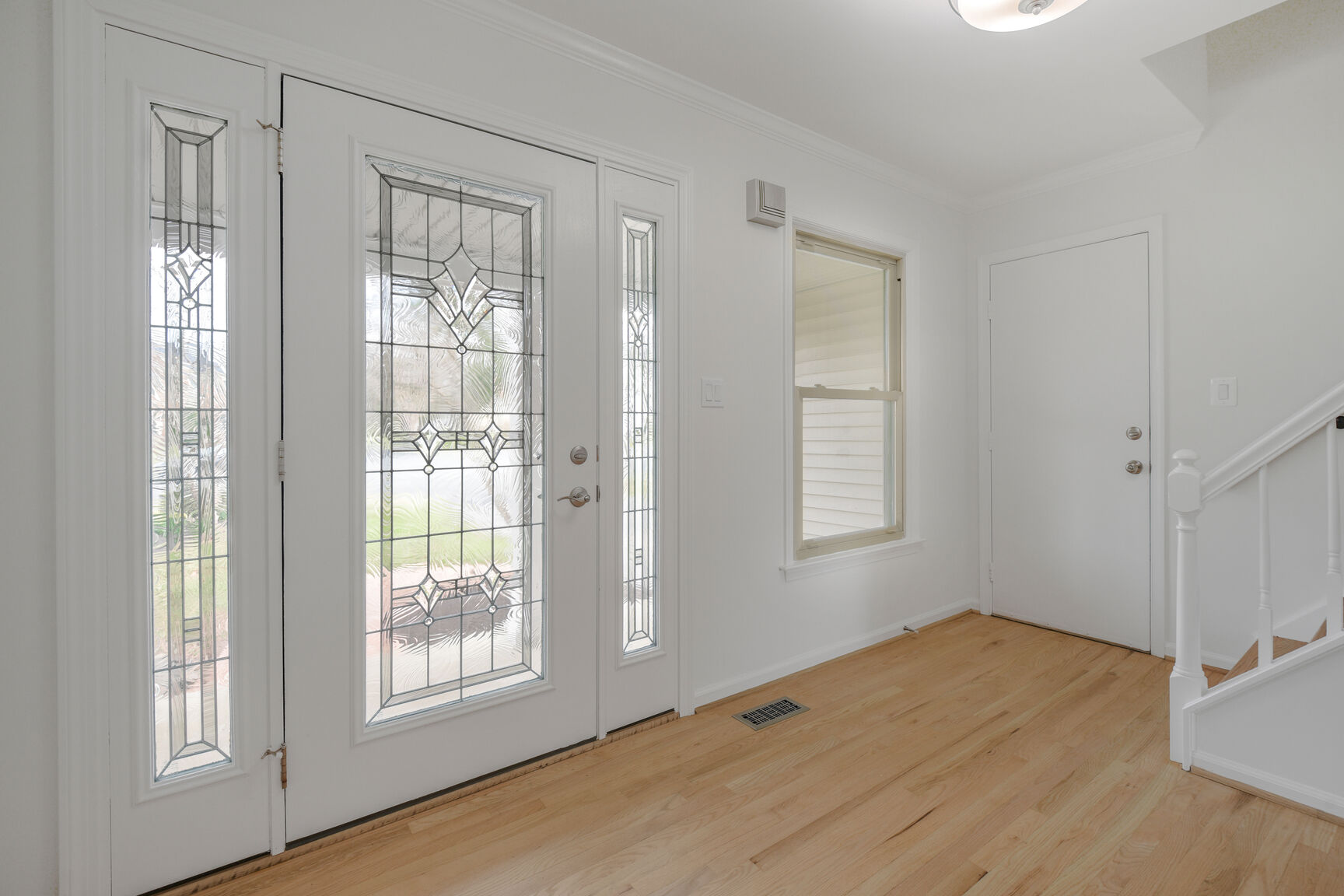 4008 Evangeline Terrace Olney, MD 20832 - Photo 6 of 54 a view of an empty room with wooden floor and a window