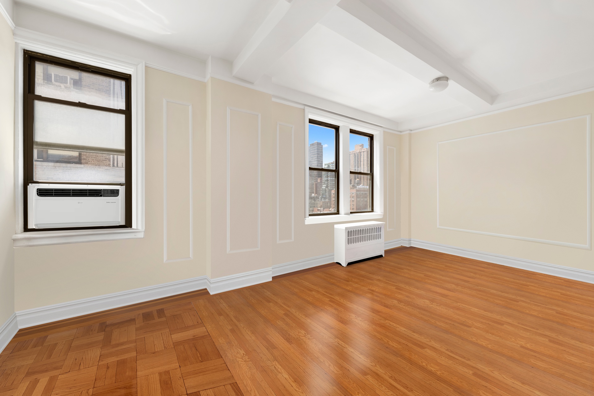 20 West 72nd Street, Unit 1106B Manhattan, NY 10023 - Photo 2 of 10 an empty room with windows and closet