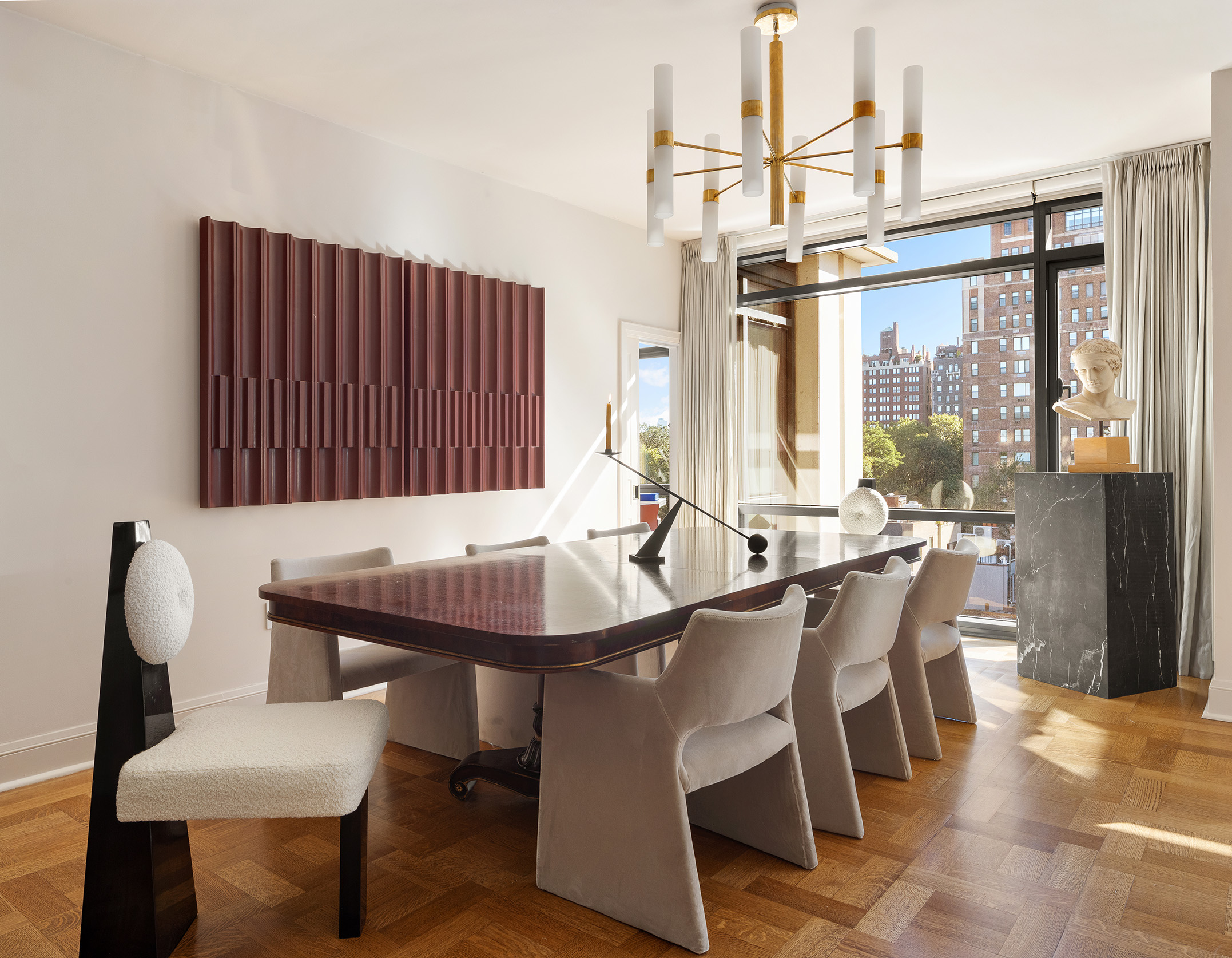 170 East End Avenue, Unit 7A Manhattan, NY 10128 - Photo 3 of 35 a view of a dining room with furniture window and outside view