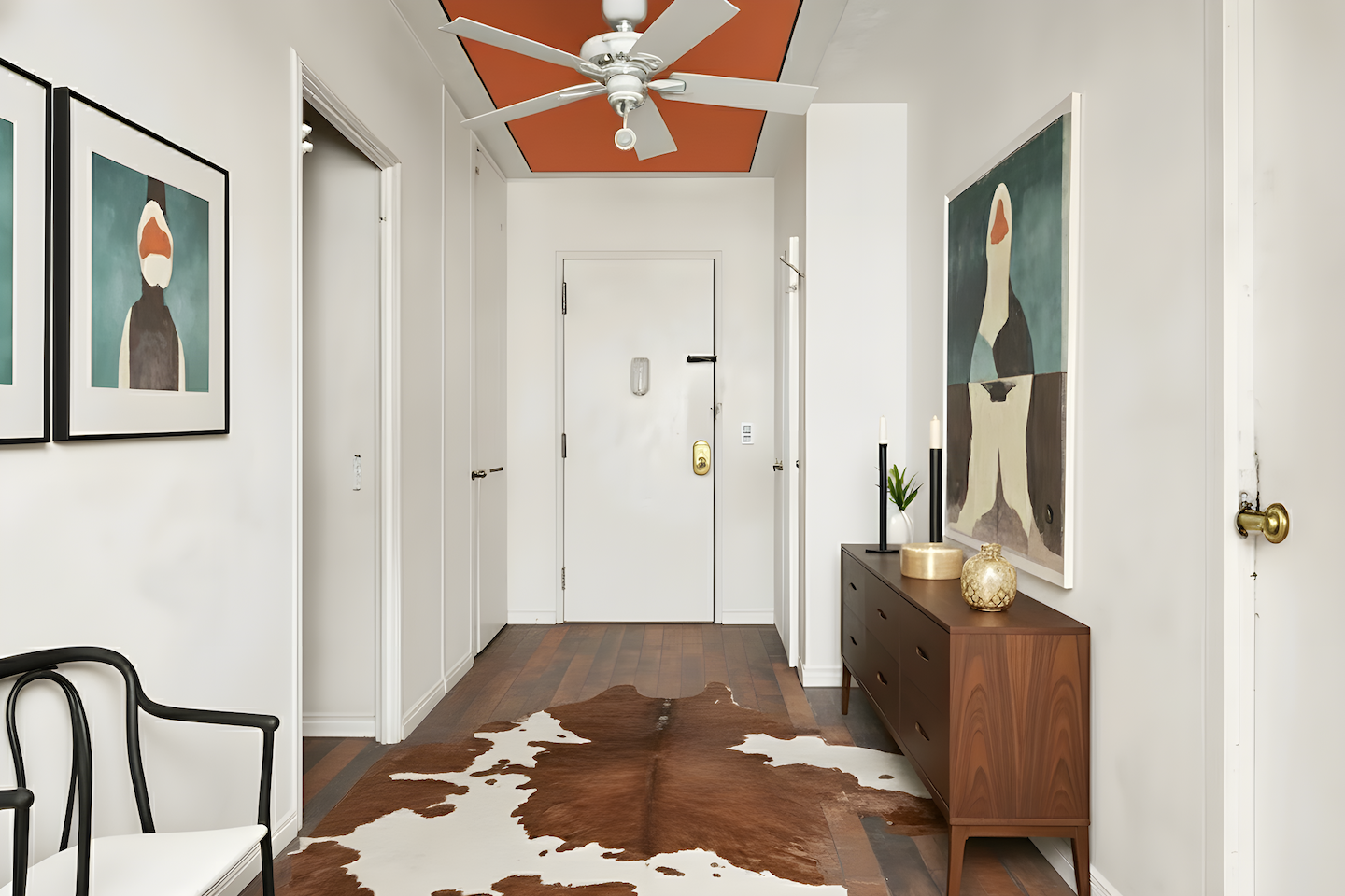 80 Central Park West, Unit 4C Manhattan, NY 10023 - Photo 4 of 11 a view of a hallway with wooden floor and dining room