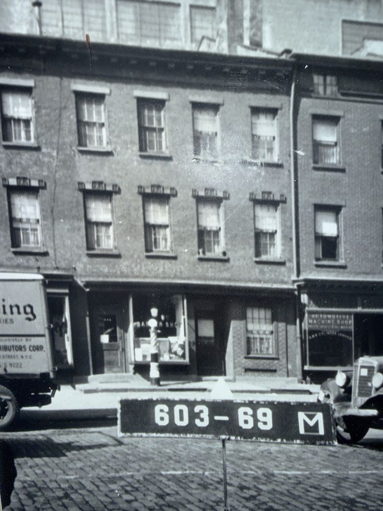 449 1/2 Hudson Street Manhattan, NY 10014 - Photo 16 of 19 a front view of a building with street