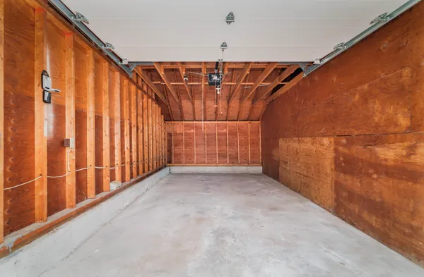 a black and white photo of a living room
