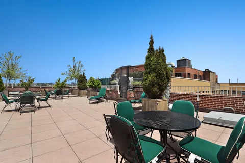 a view of a terrace with sitting area