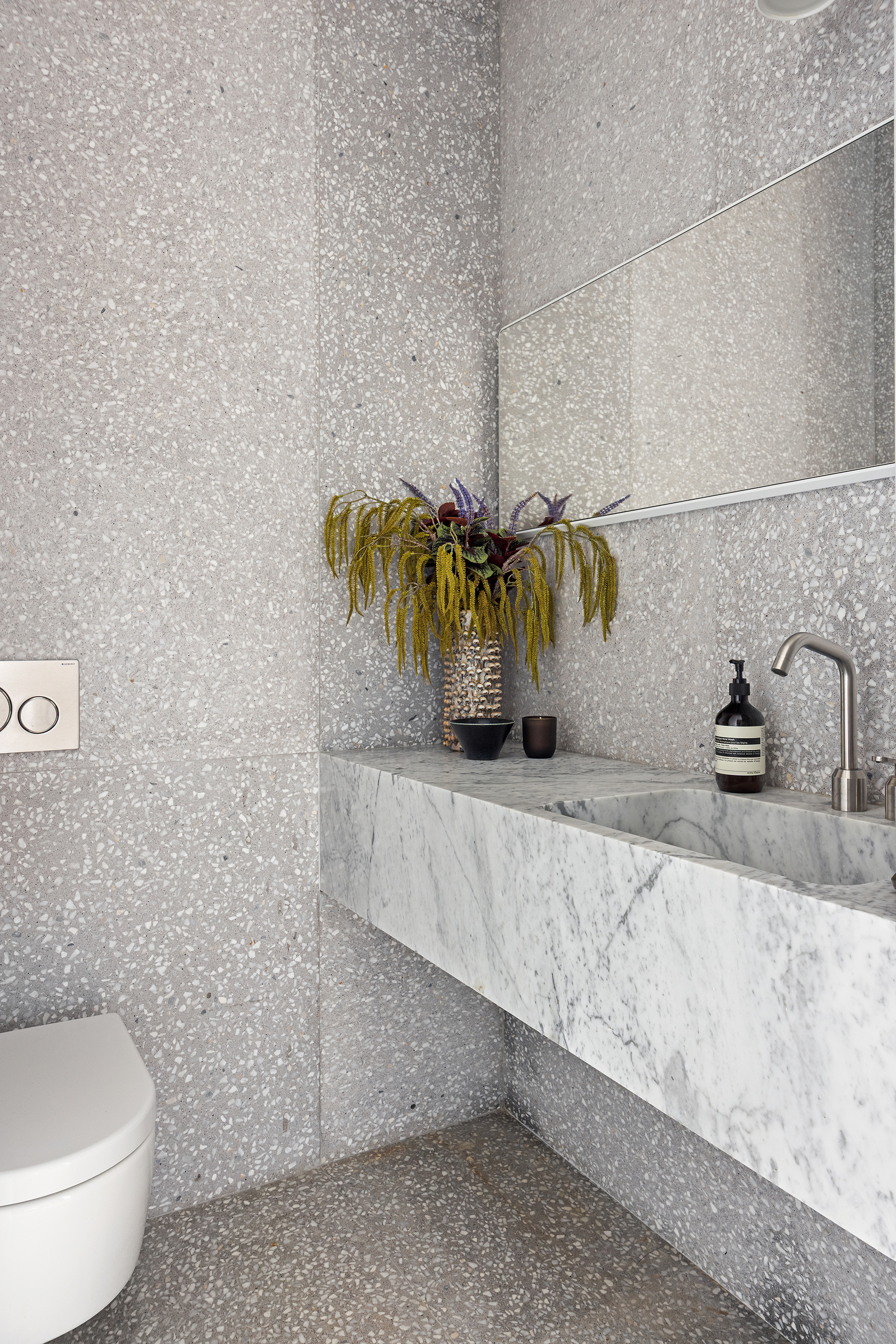 455 West 19th Street, Unit PH2 Manhattan, NY 10011 - Photo 22 of 26 a bathroom with a granite countertop sink and a mirror