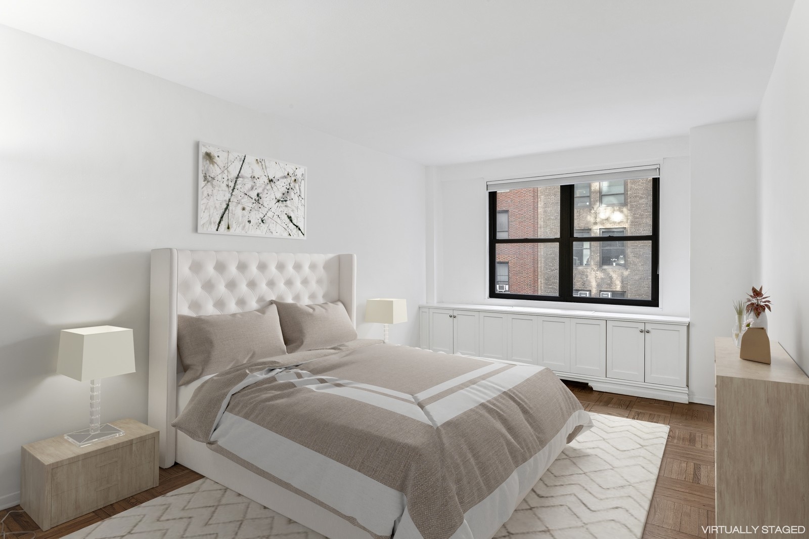 116 Central Park South, Unit 7C Manhattan, NY 10019 - Photo 3 of 6 a bedroom with a large bed and a window