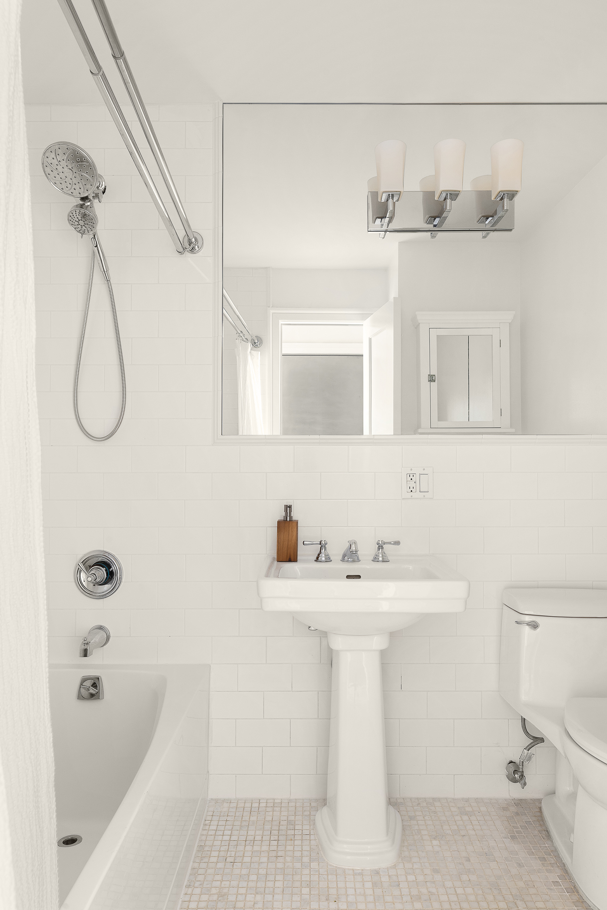 695 Degraw Street, Unit 2 Brooklyn, NY 11217 - Photo 9 of 11 a bathroom with a sink a toilet and shower