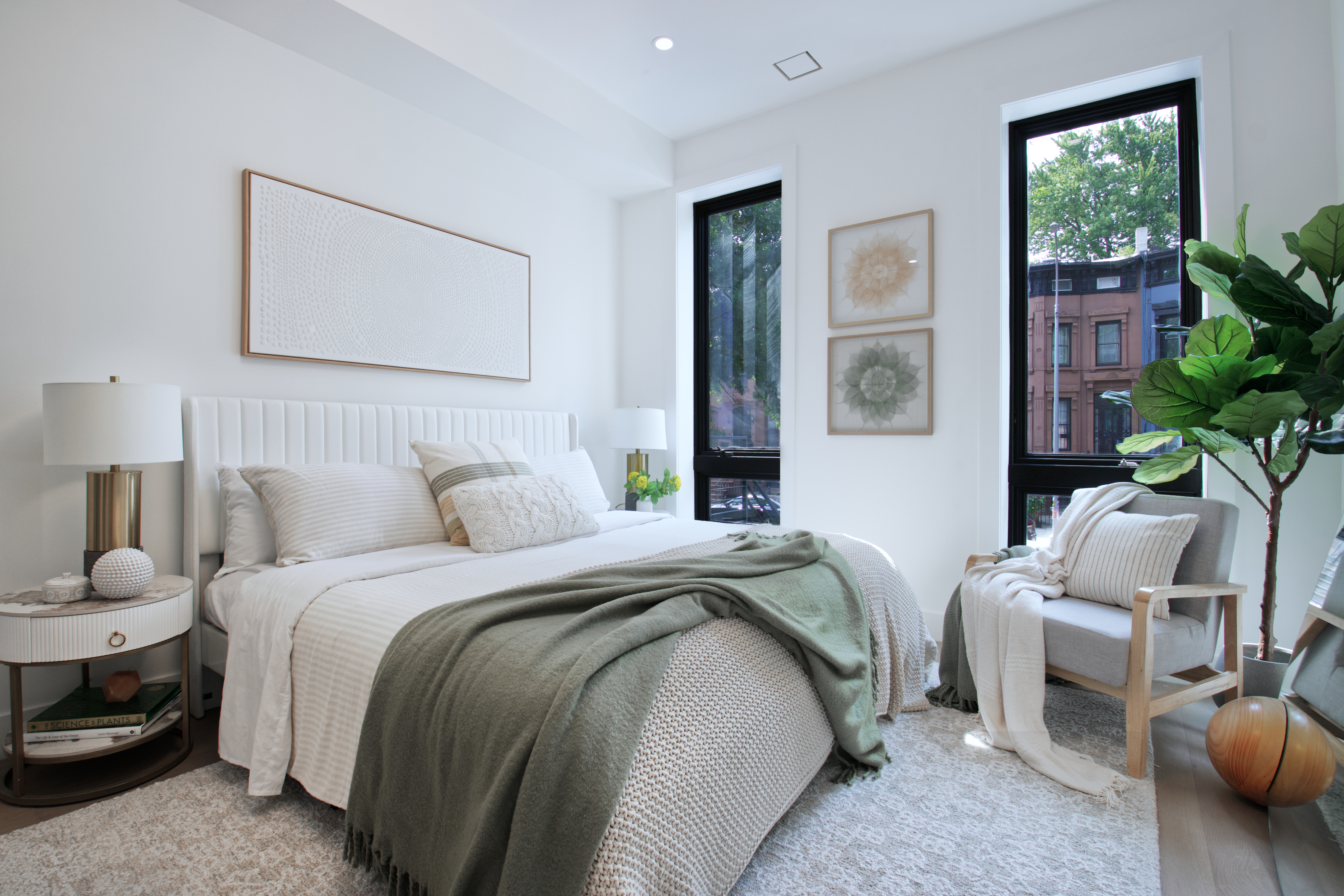 255 Macon Street Brooklyn, NY 11216 - Photo 12 of 36 a spacious bedroom with a bed and a window