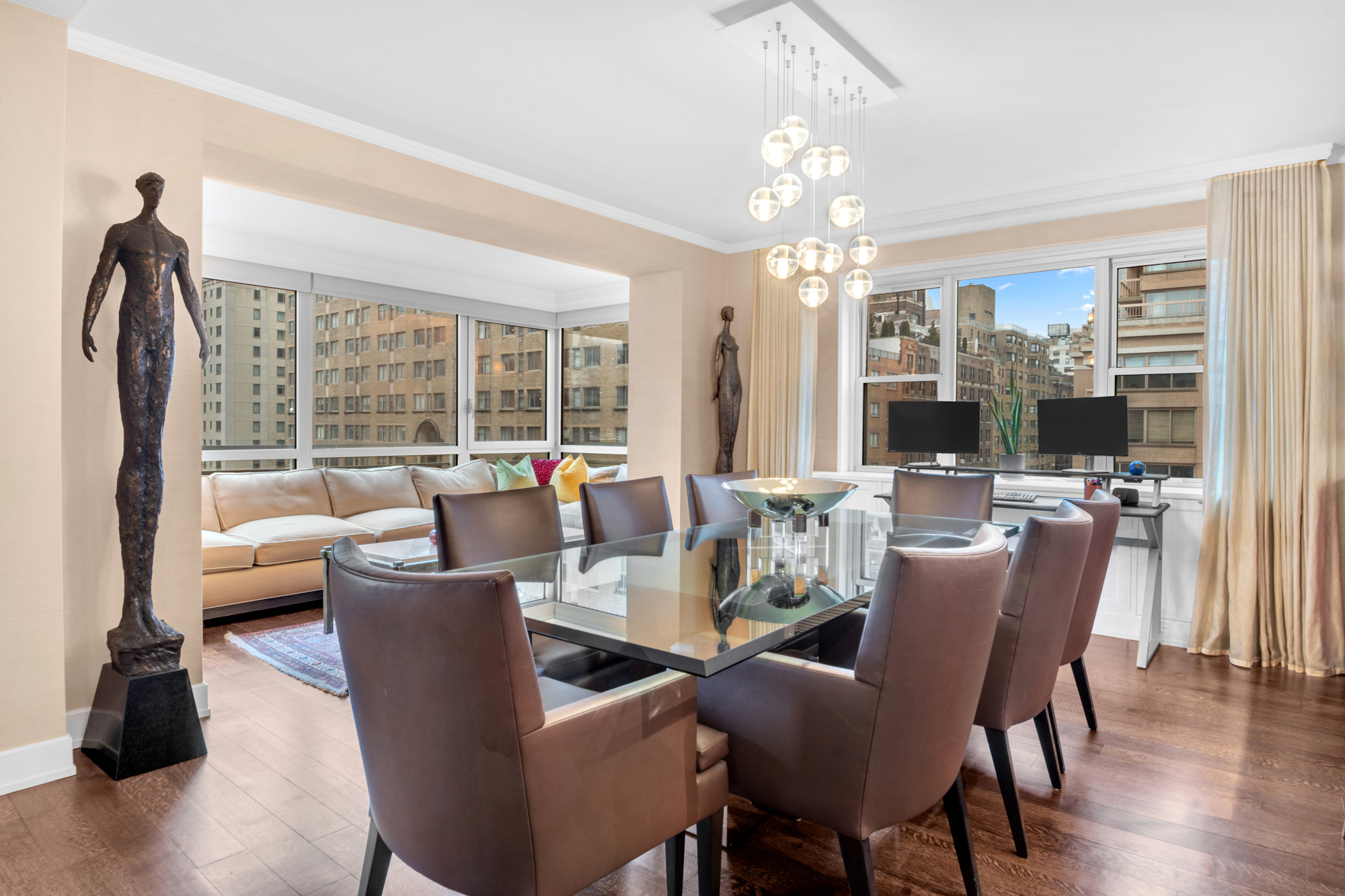 150 East 69th Street, Unit 6Q Manhattan, NY 10021 - Photo 5 of 15 a view of a dining room with furniture window and outside view