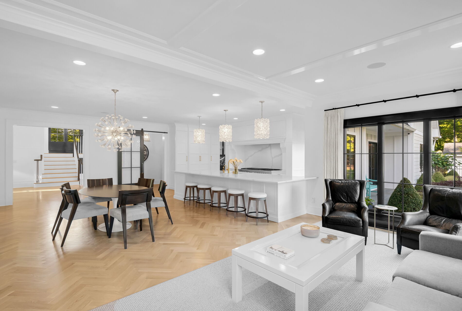 838 Seneca Road Franklin Lakes, NJ 07417 - Photo 18 of 92 a living room with furniture and a dining table with kitchen view