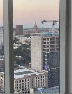 a view of a city with tall buildings