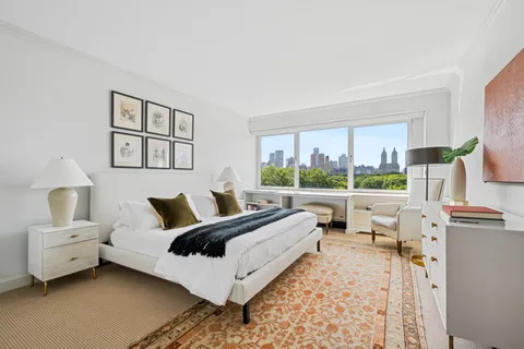 a bathroom with a tub and a shower