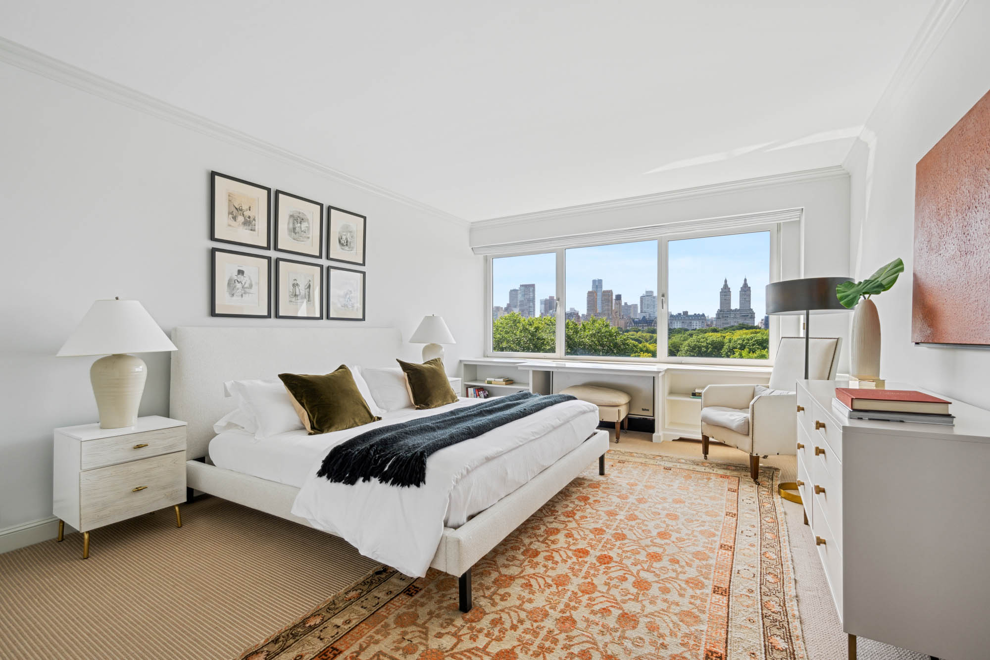 936 5th Avenue, Unit 10AB Manhattan, NY 10021 - Photo 17 of 37 a living room with furniture and a large window