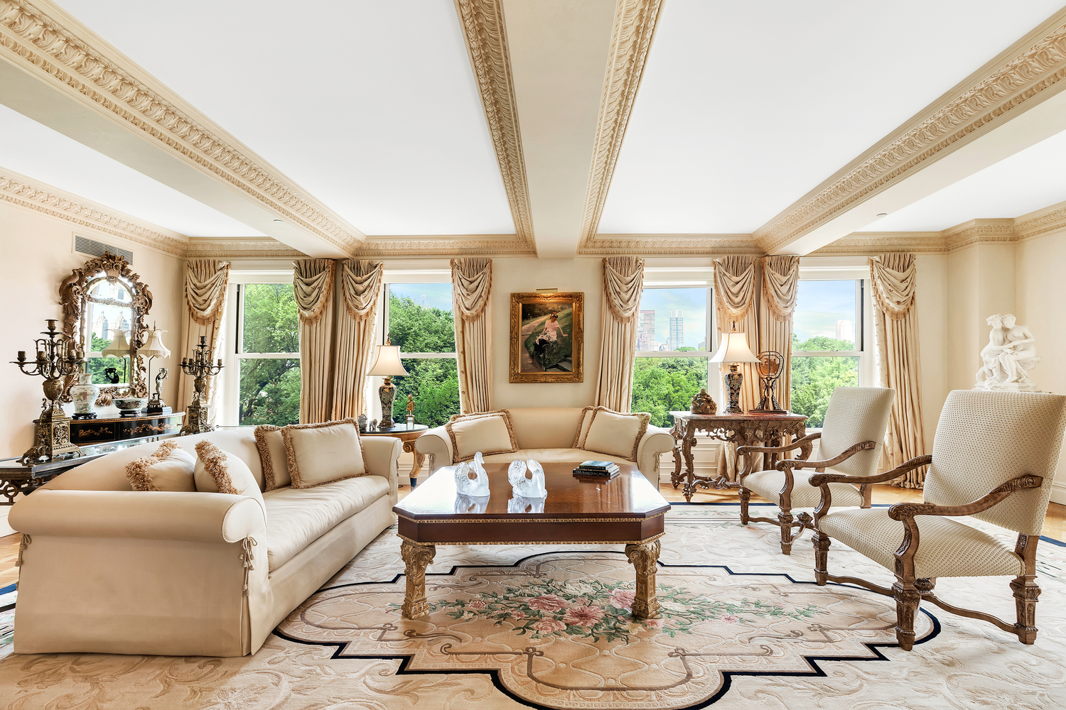 838 5th Avenue, Unit 6 Manhattan, NY 10065 - Photo 3 of 23 a living room with furniture and a large window