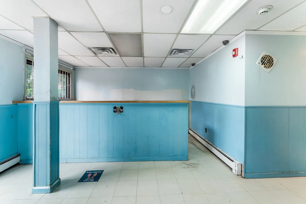 a view of a room with rack on the wall