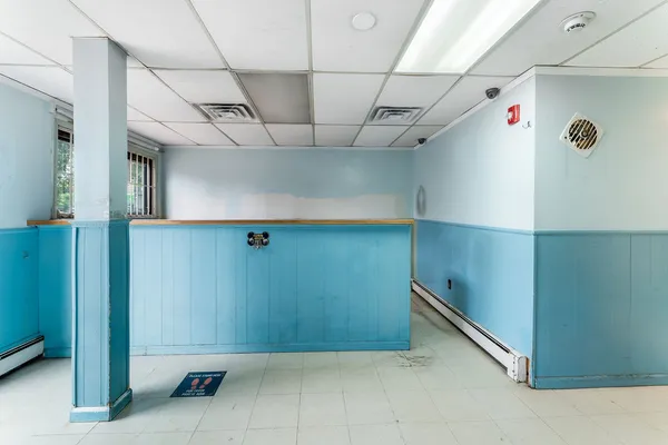 a view of a room with rack on the wall