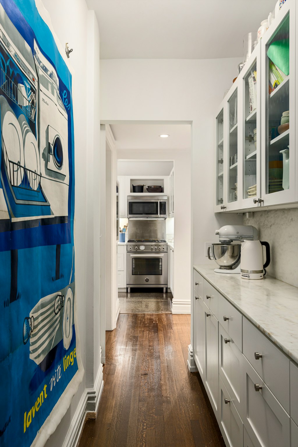 115 Willow Street, Unit 5A Brooklyn, NY 11201 - Photo 5 of 12 a kitchen with stainless steel appliances a stove and a refrigerator