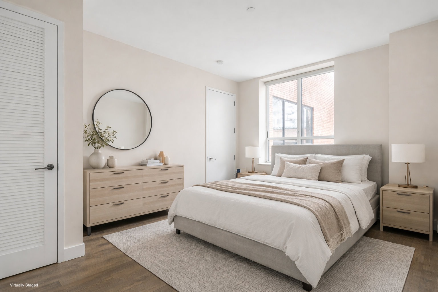 416 West 52nd Street, Unit 725 Manhattan, NY 10019 - Photo 3 of 15 a bedroom with a bed and a dresser