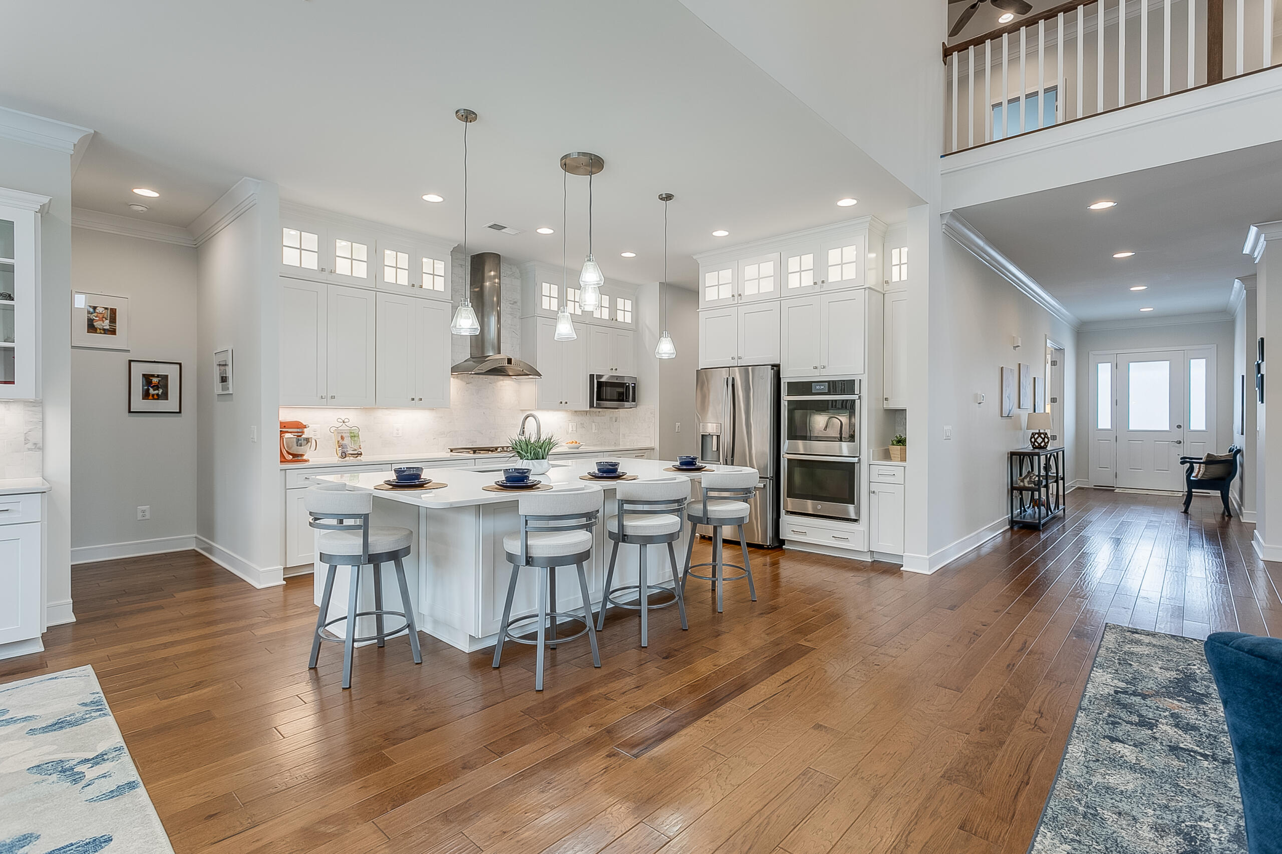 1011 Justinian Street Leesburg, VA 20175 - Photo 3 of 56 a view of a dining room with furniture and wooden floor