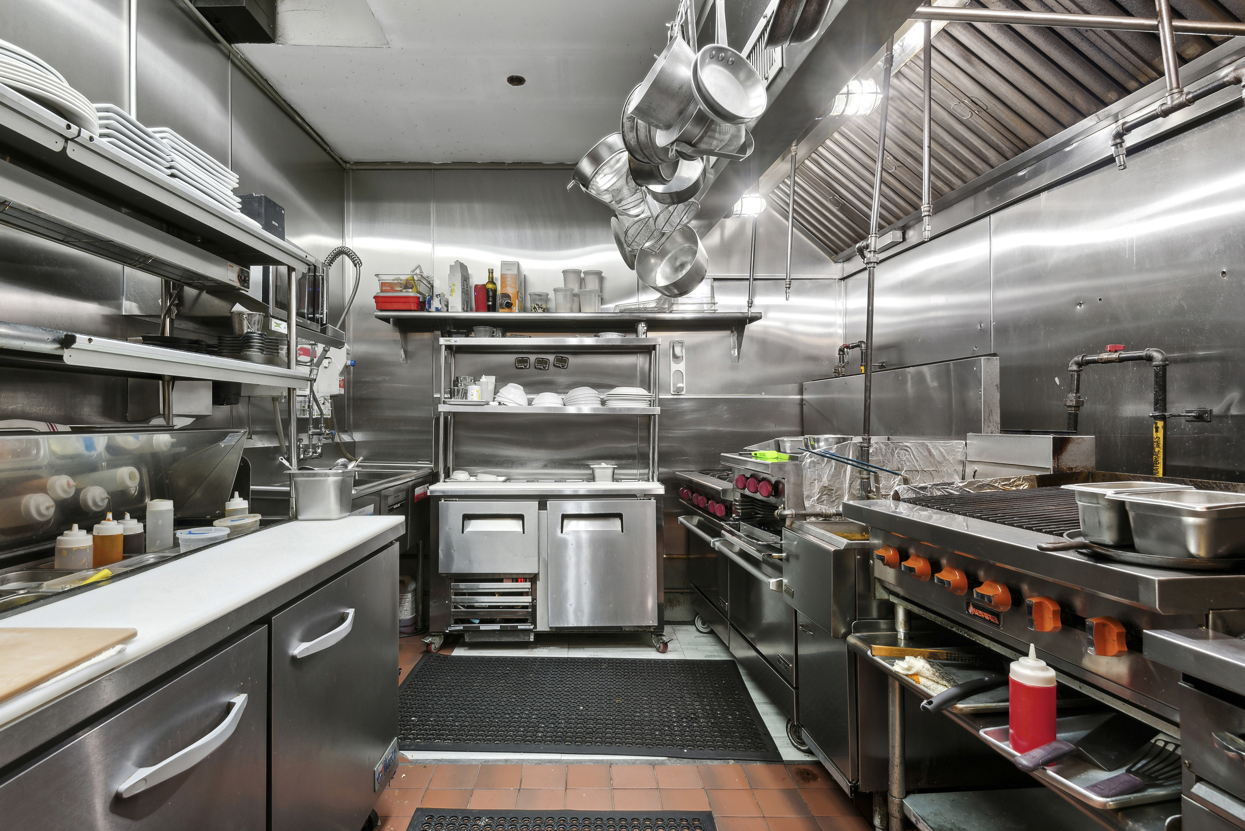 397 5th Avenue Brooklyn, NY 11215 - Photo 6 of 14 a kitchen with lots of counter top space