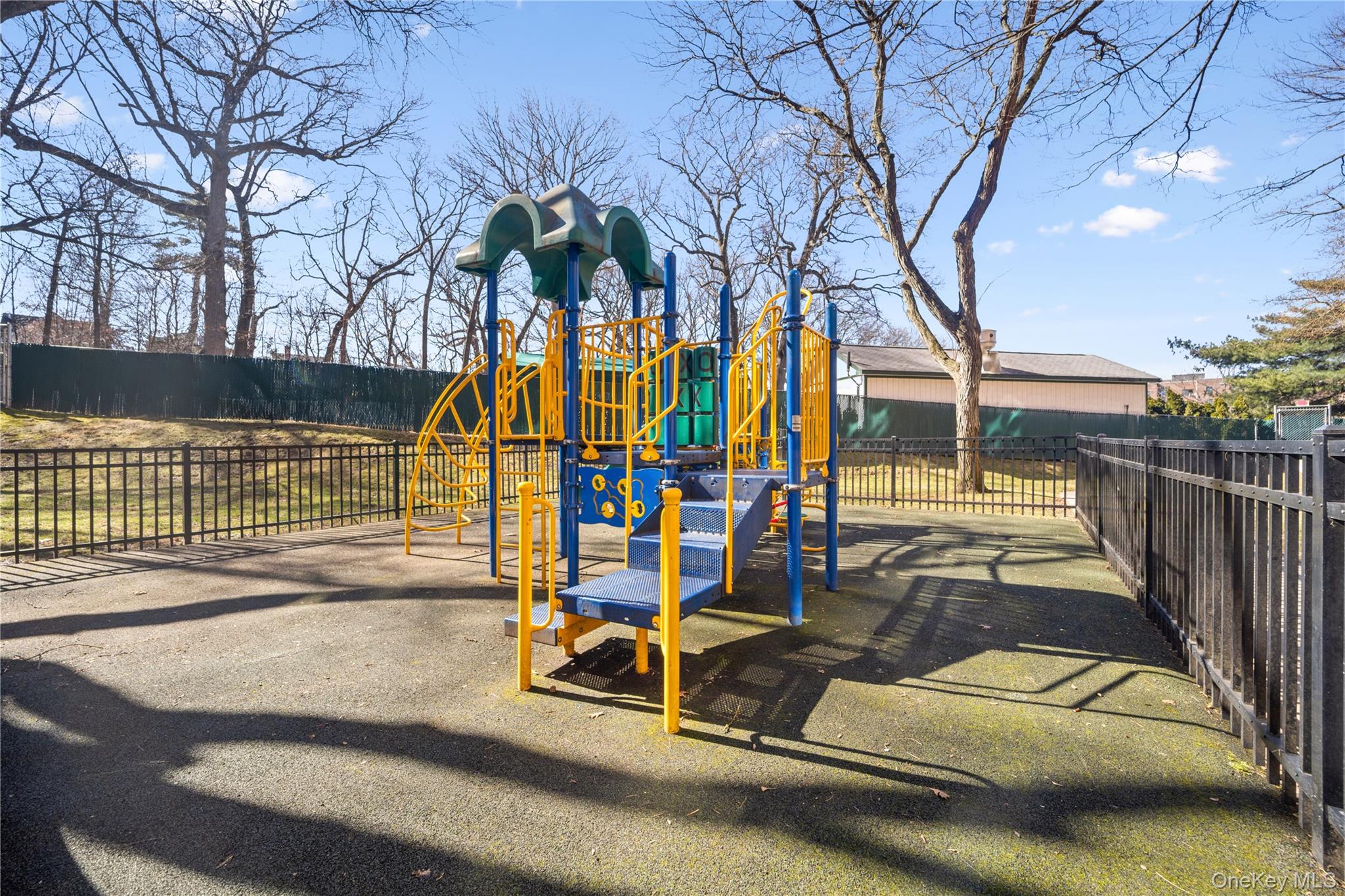 75-34 Bell Boulevard, Unit LD Queens, NY 11364 - Photo 4 of 26 a view of a swimming pool with an outdoor space