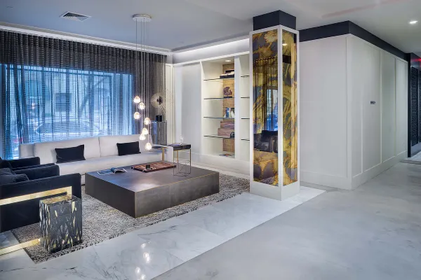 a lobby with furniture and window
