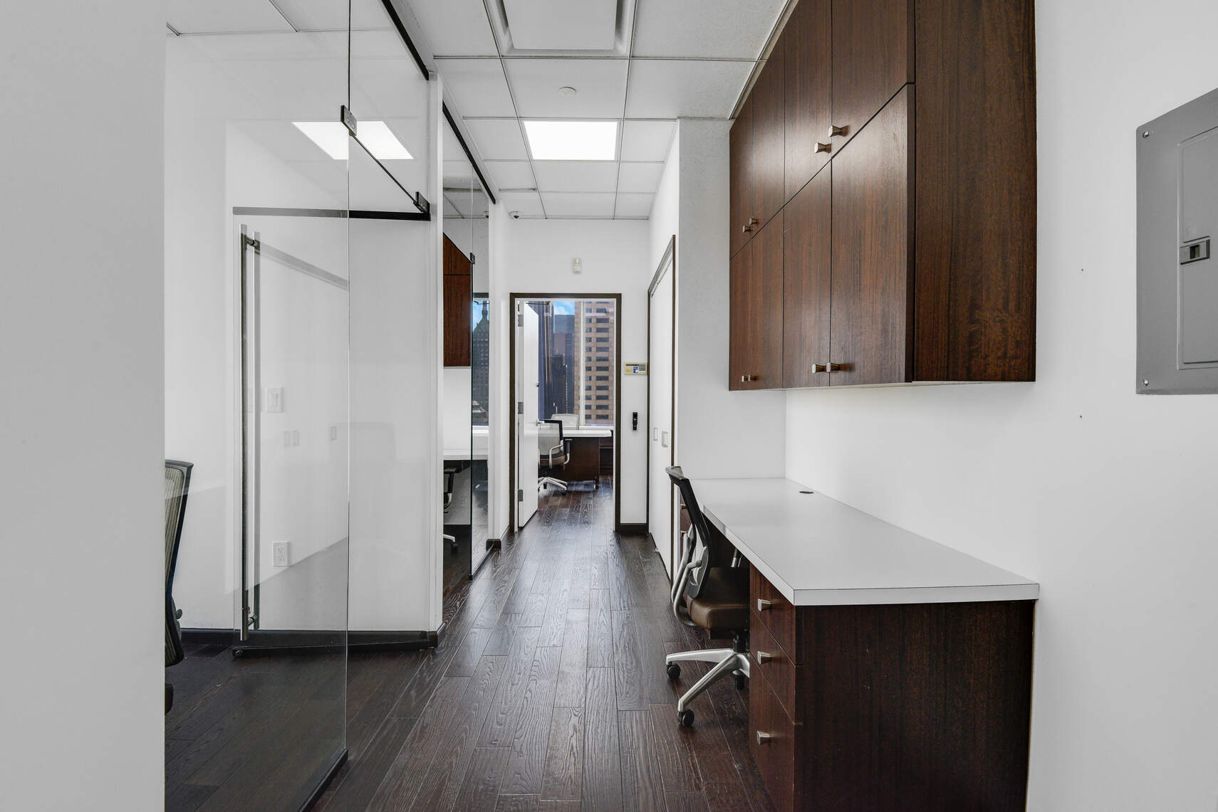 50 West 47th Street, Unit Undisclosed Manhattan, NY 10036 - Photo 15 of 27 a kitchen with a refrigerator a sink and cabinets