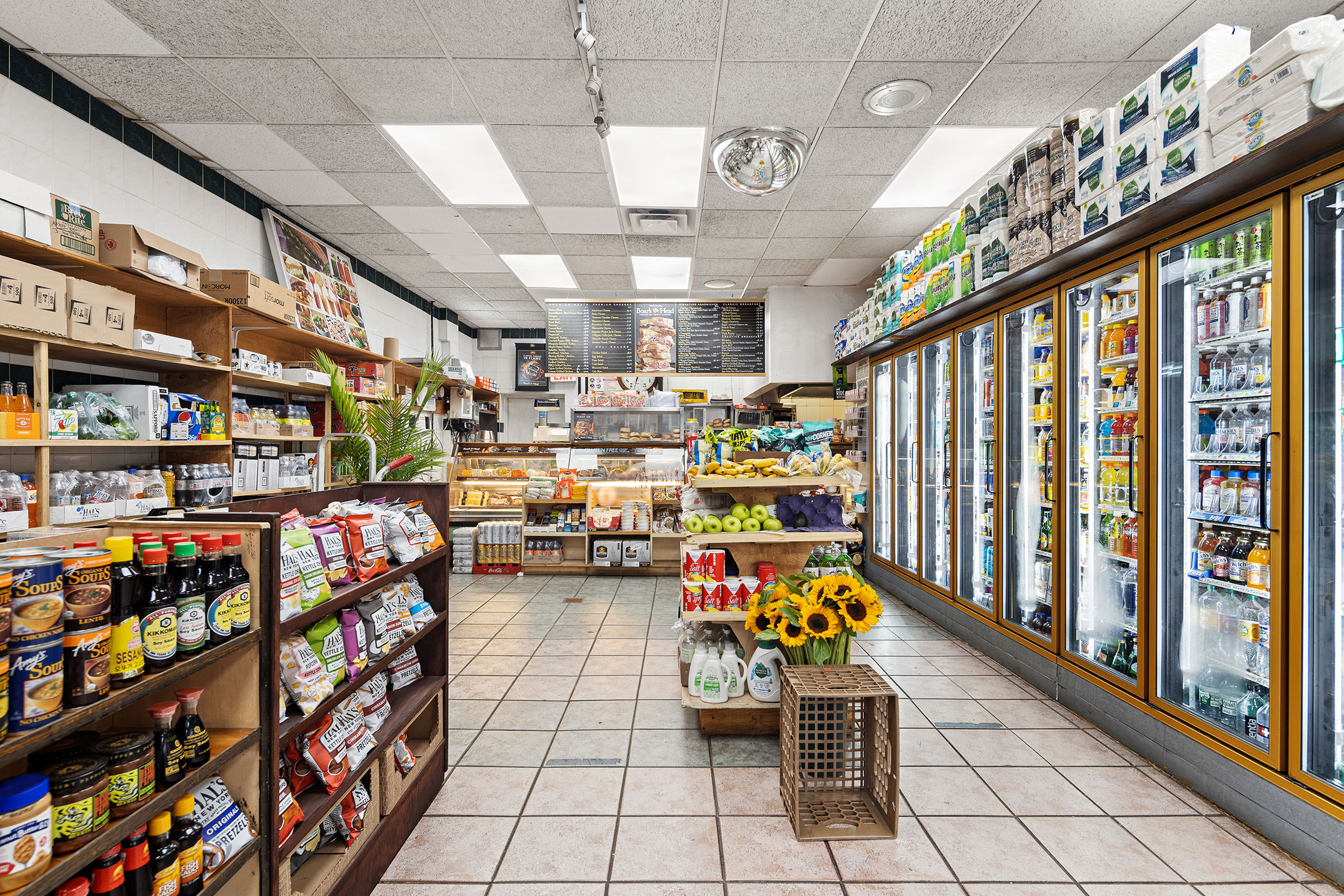 80 7th Avenue Brooklyn, NY 11217 - Photo 7 of 8 a garage with furniture and a book shelf