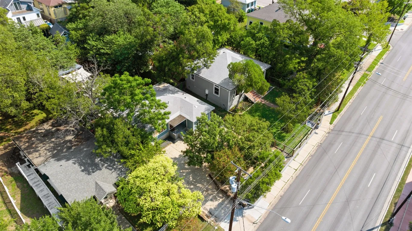 a view of a garden with a fountain