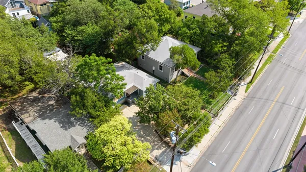 a view of a garden with a fountain