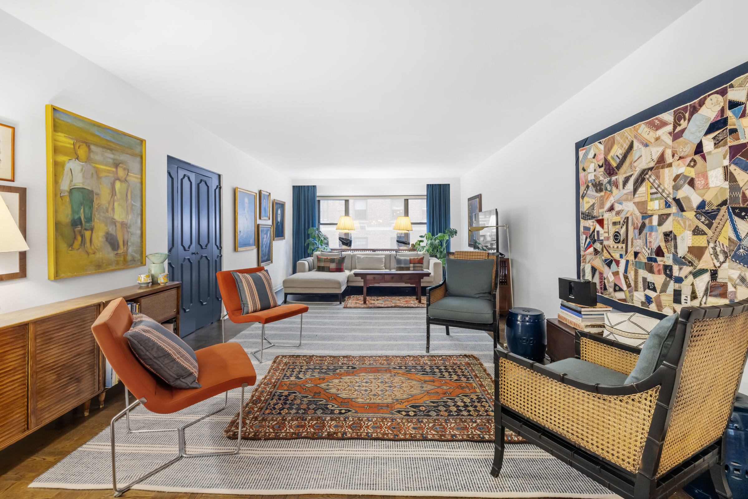 16 Sutton Place, Unit 11A Manhattan, NY 10022 - Photo 2 of 19 a living room with furniture and a rug