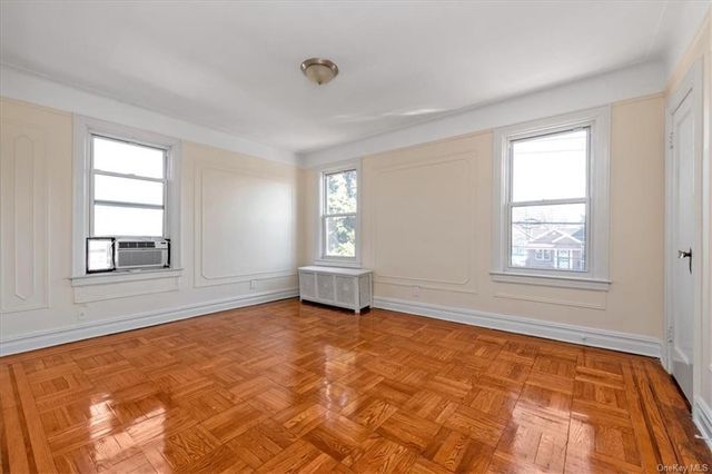 1186 Brooklyn Avenue, Unit N A Brooklyn, NY 11203 - Photo 10 of 17 a view of an empty room with a window