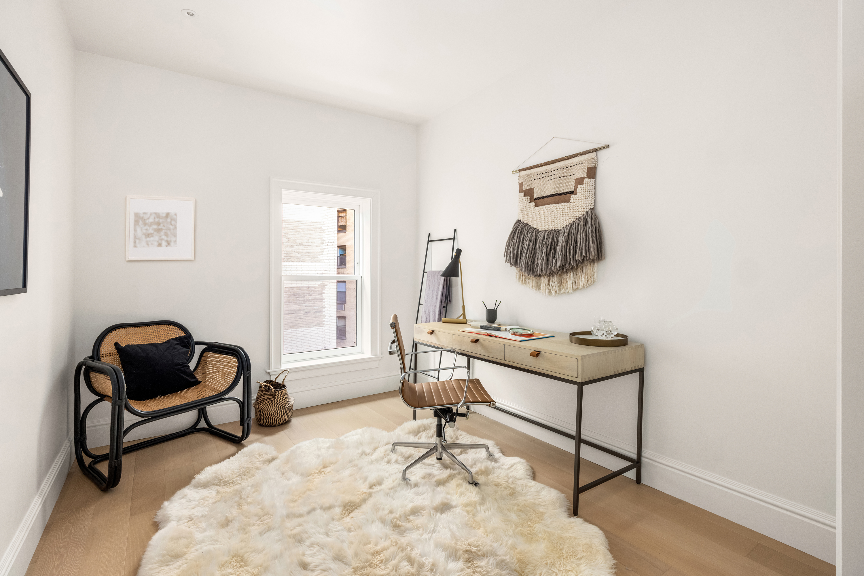 344 West 84th Street, Unit PH Manhattan, NY 10024 - Photo 10 of 19 a living room with furniture and a rug