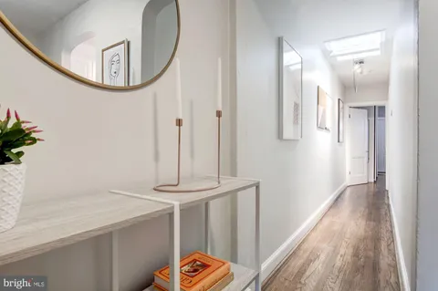 a bedroom with bed and window