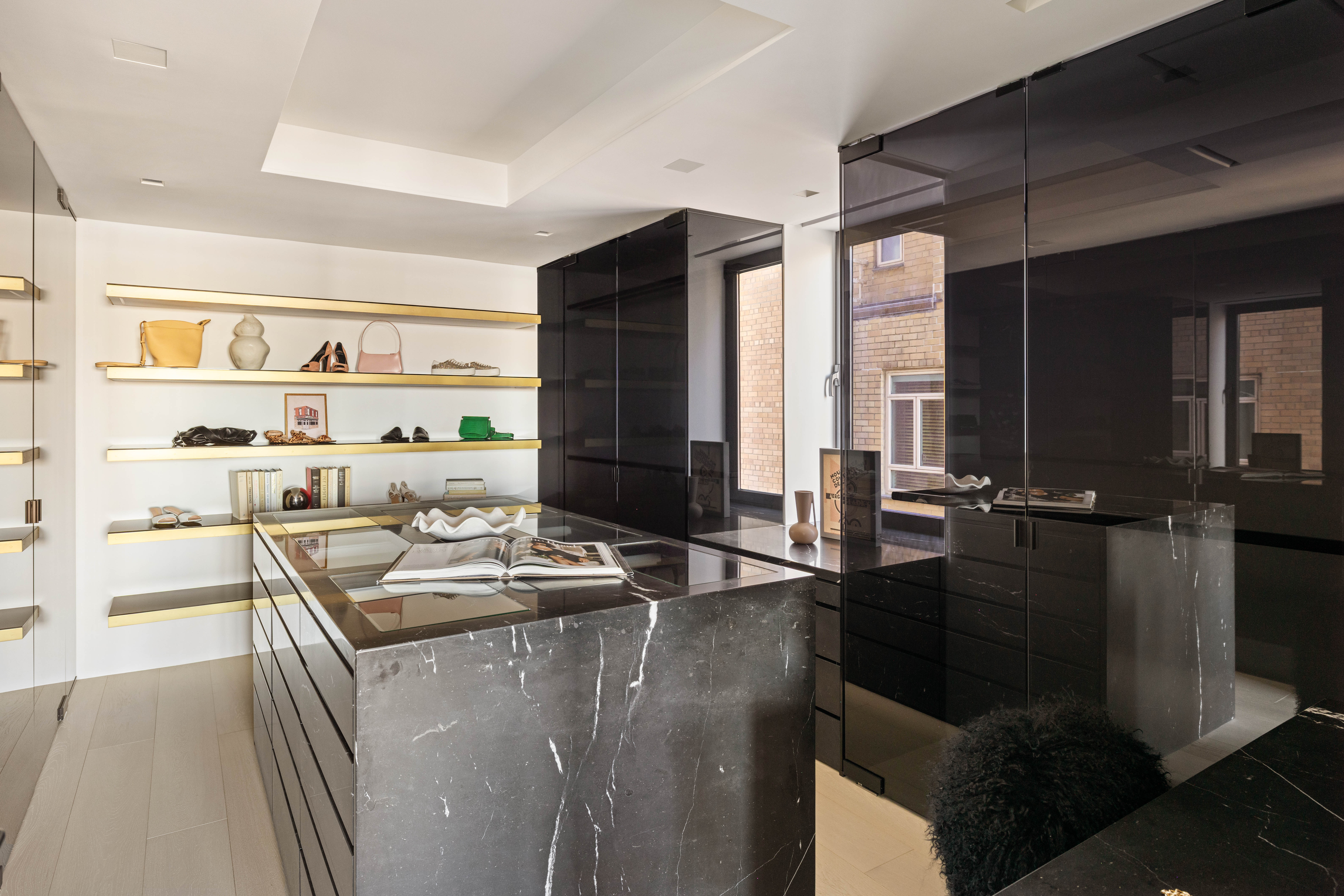 230 Central Park South Manhattan, NY 10019 - Photo 13 of 23 a kitchen with a sink stove and refrigerator