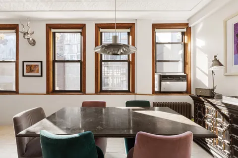 a kitchen with granite countertop a sink and a stove top oven