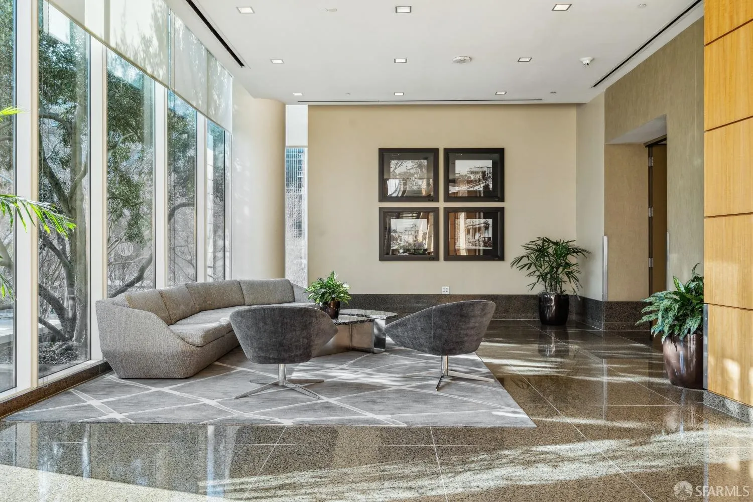 a view of a patio with couches and potted plants
