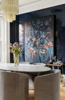 a room with table and chairs