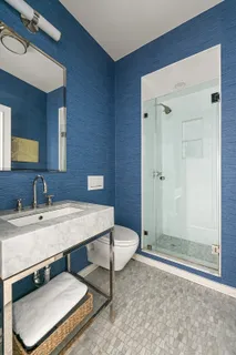 a bedroom with bed and a window