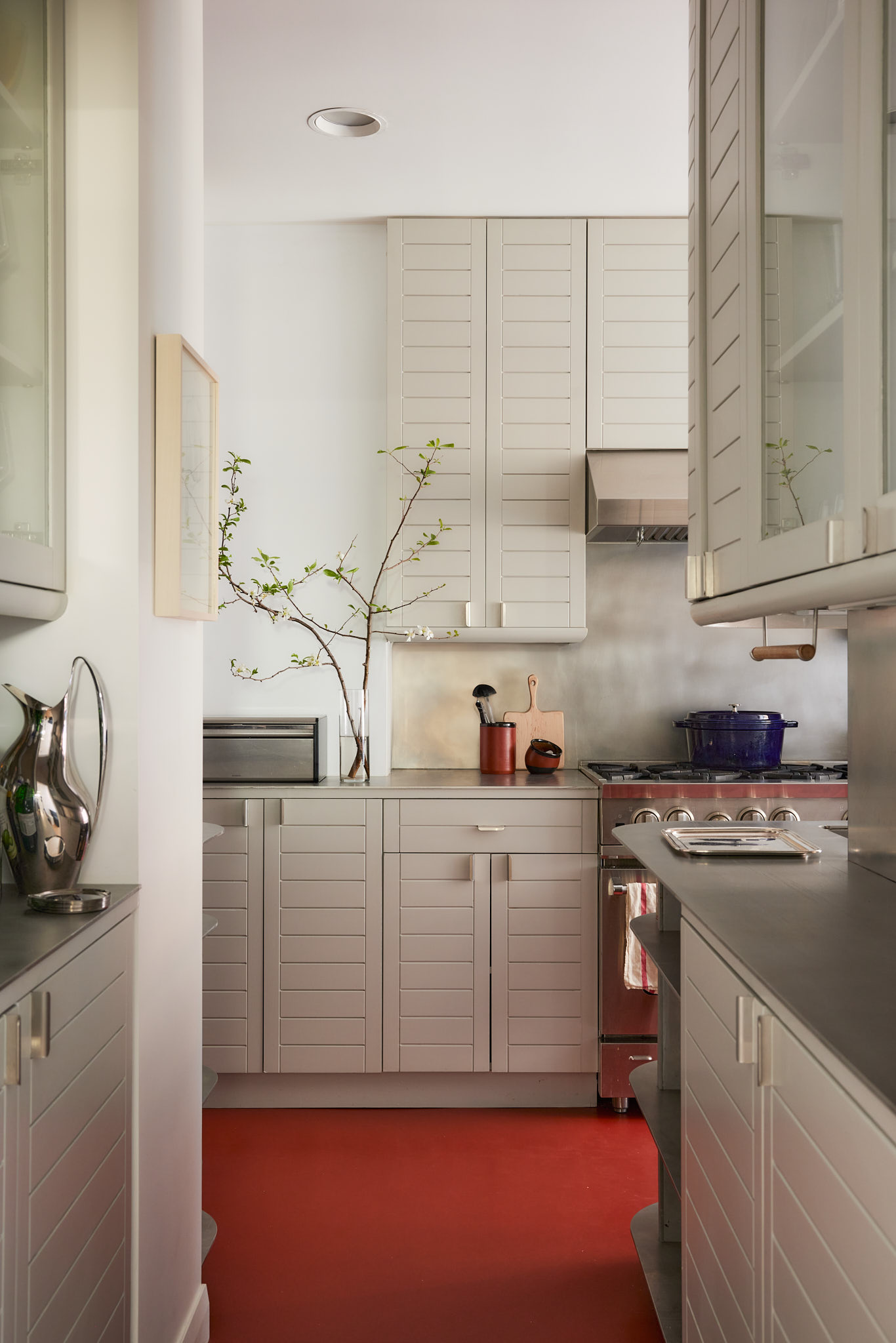 25 East End Avenue, Unit 11E Manhattan, NY 10075 - Photo 6 of 19 a kitchen with stainless steel appliances granite countertop a sink stove and cabinets