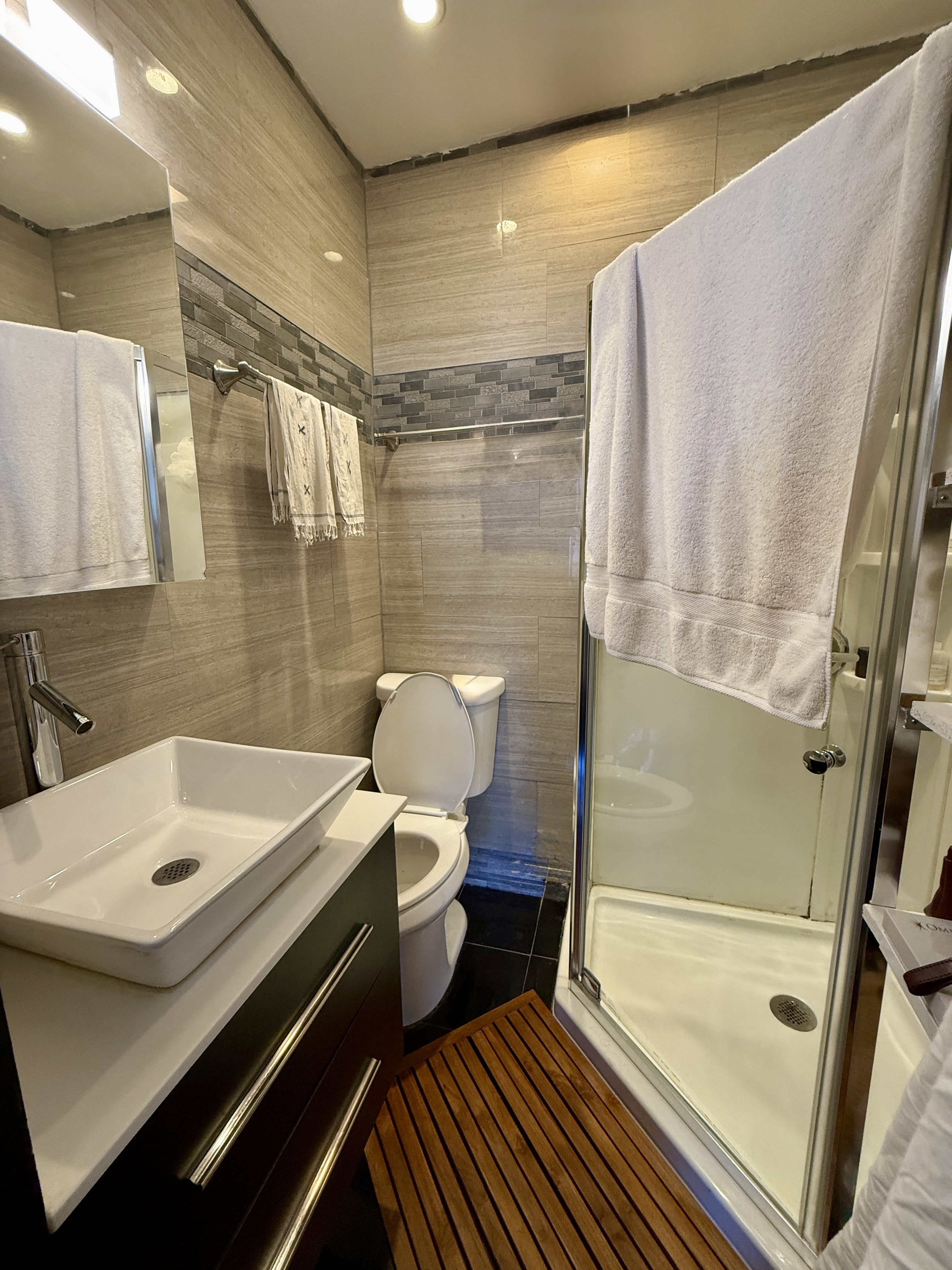 814 Putnam Avenue, Unit 2 Brooklyn, NY 11221 - Photo 7 of 8 a bathroom with a sink and toilet