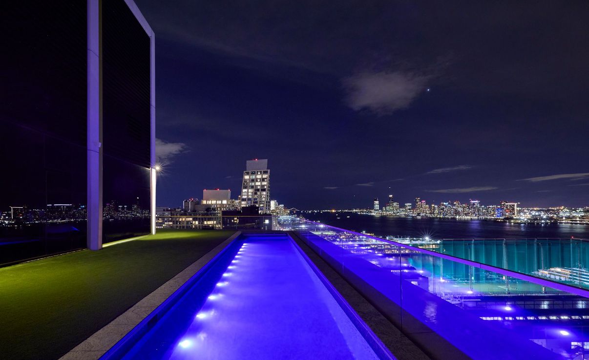 551 West 21st Street, Unit PH Manhattan, NY 10011 - Photo 43 of 51 a view of swimming pool outdoor seating and city view