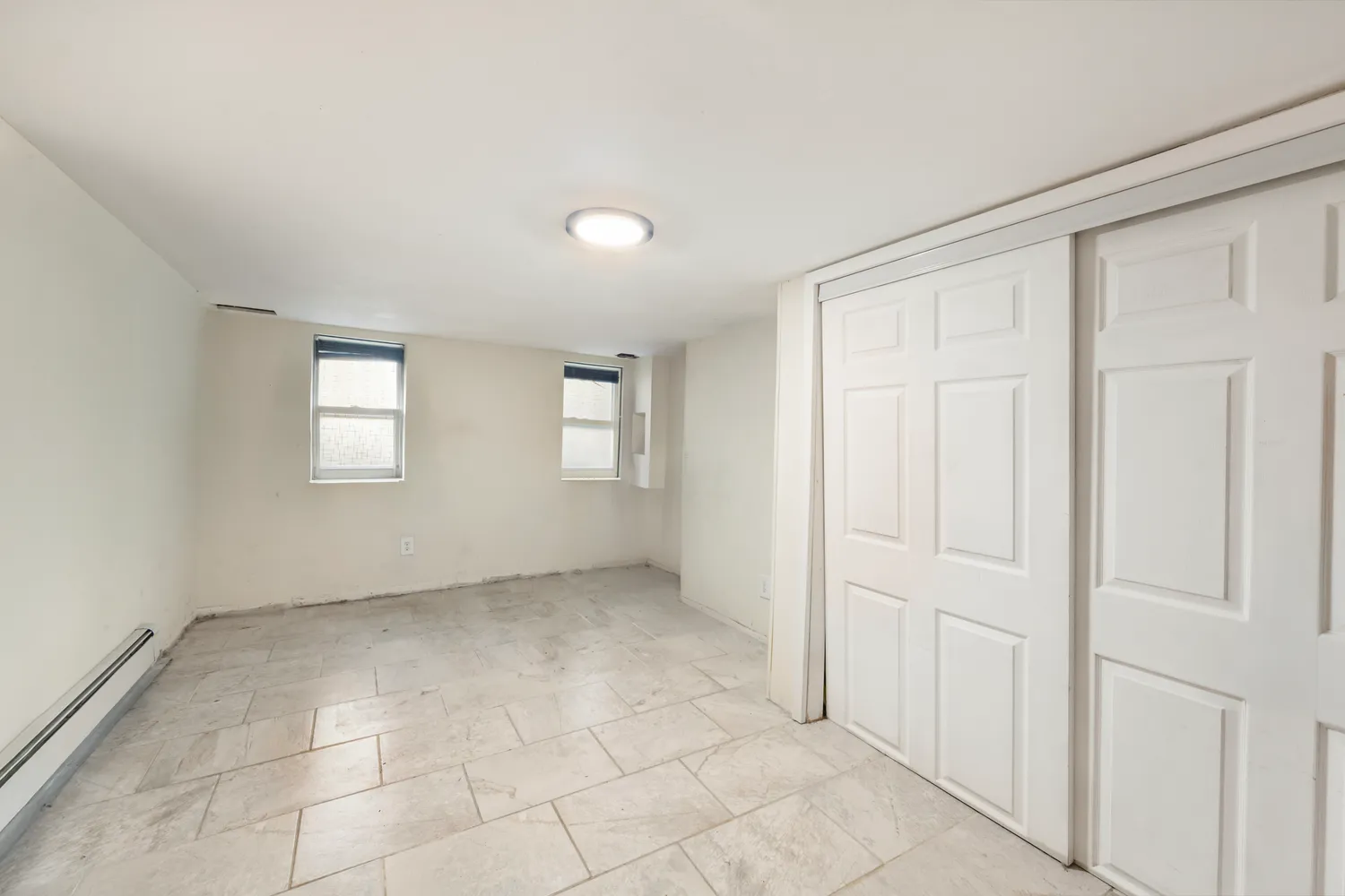 an empty room with windows