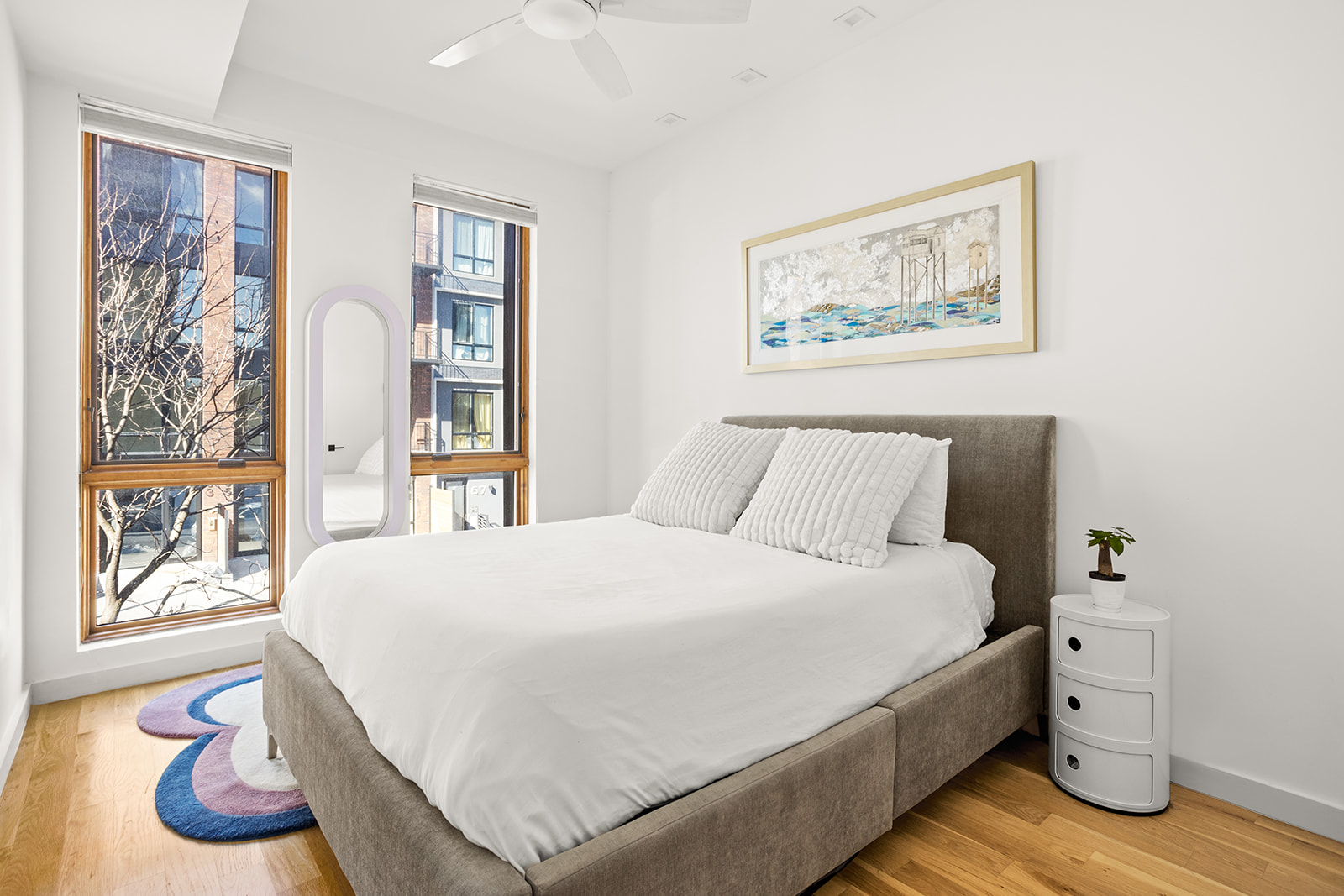 64 Stanhope Street, Unit 2A Brooklyn, NY 11221 - Photo 4 of 9 a bedroom with furniture and wooden floor