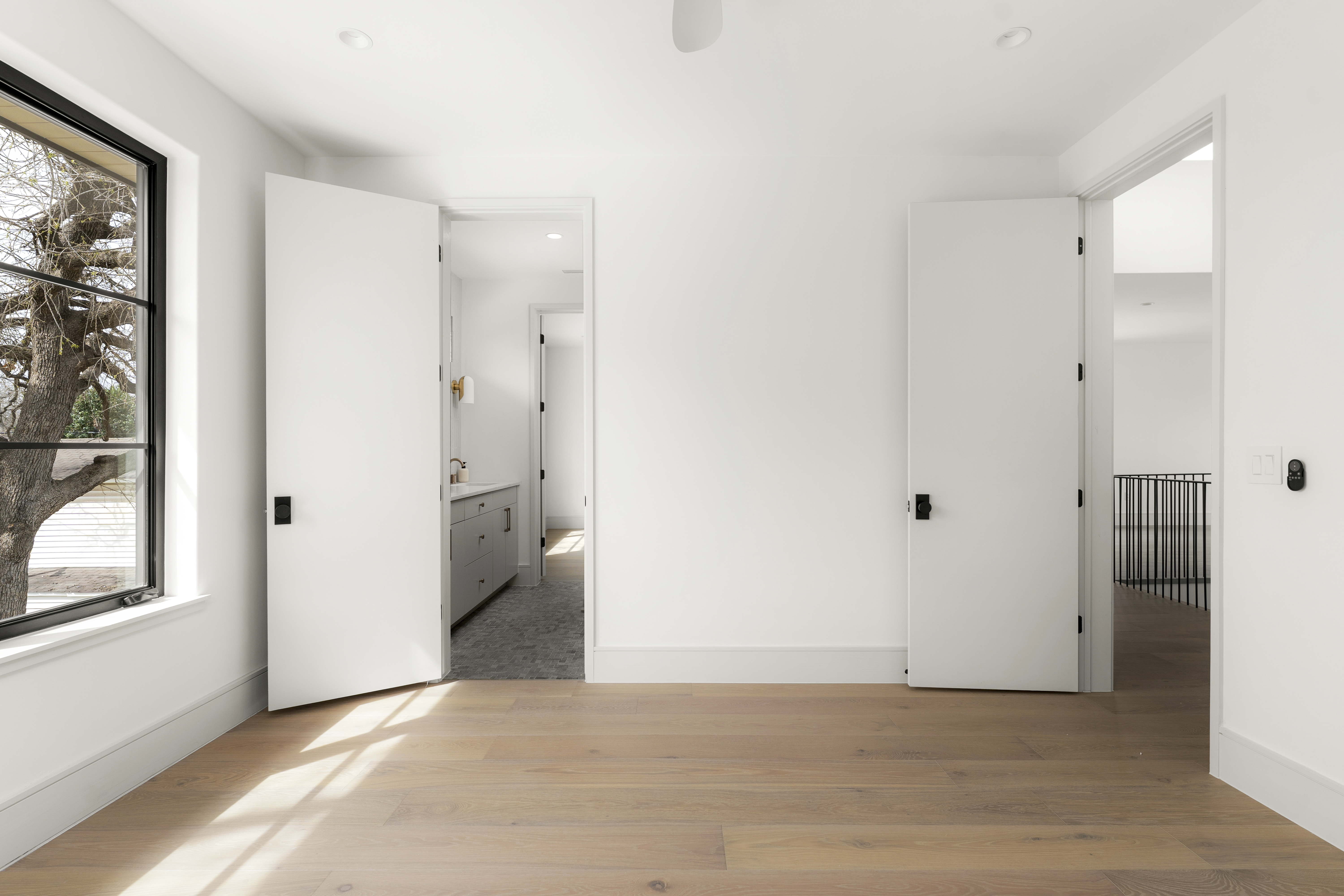 3411 Bridle Path Austin, TX 78703 - Photo 71 of 76 a view of a big room with wooden floor and windows