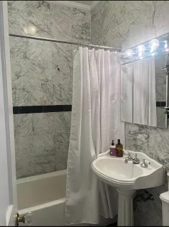 a bathroom with a sink and a bathtub